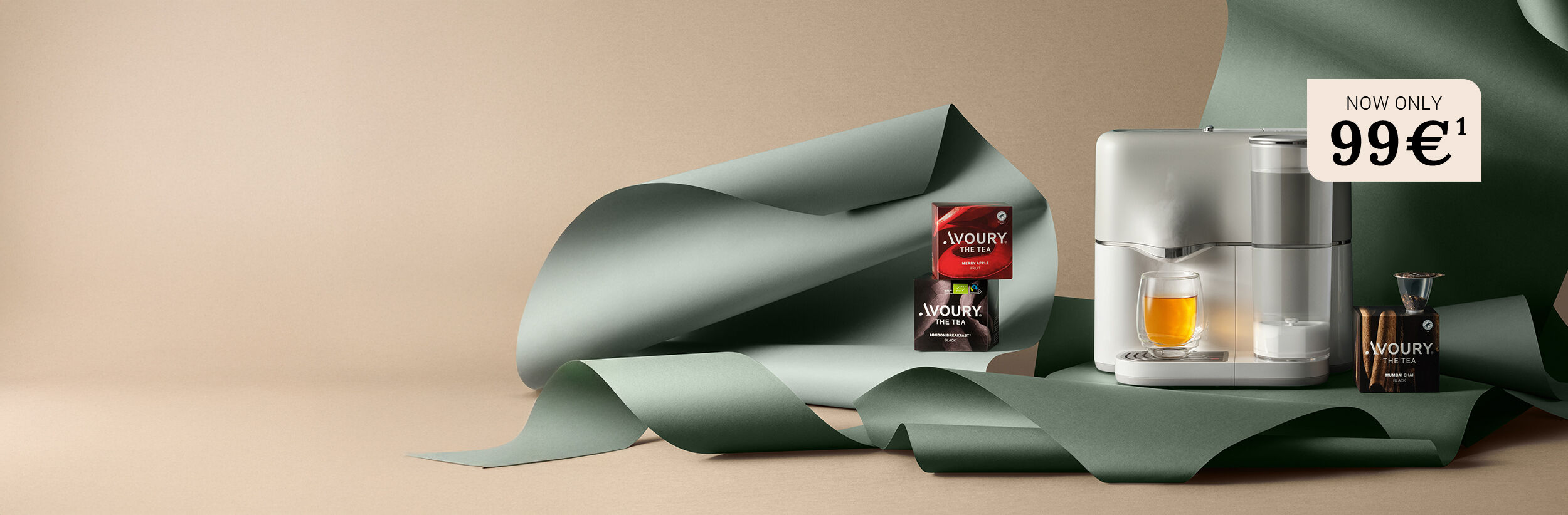 3 Modern tea machines stands on a beige surface.