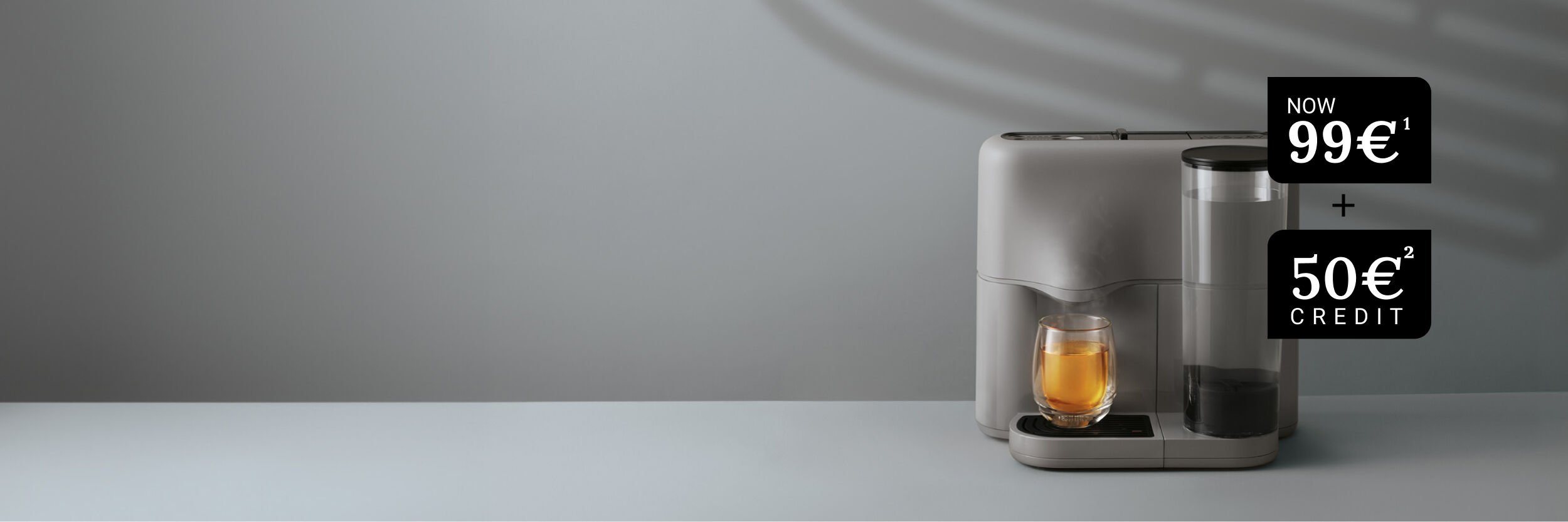 Grey/Black Avoury Tea Machine with a 99€ and 50€ Credit Tag