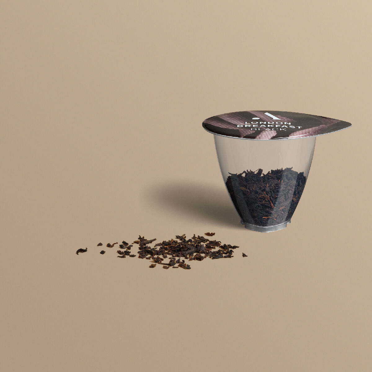 avoury tea capsule with loose black tea leaves