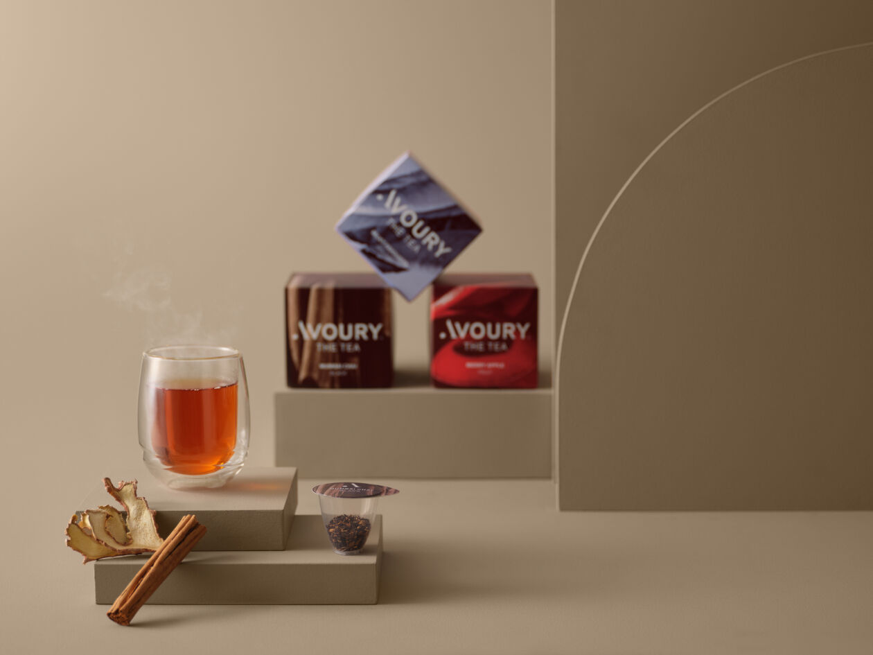 Tea packages and glass of tea 