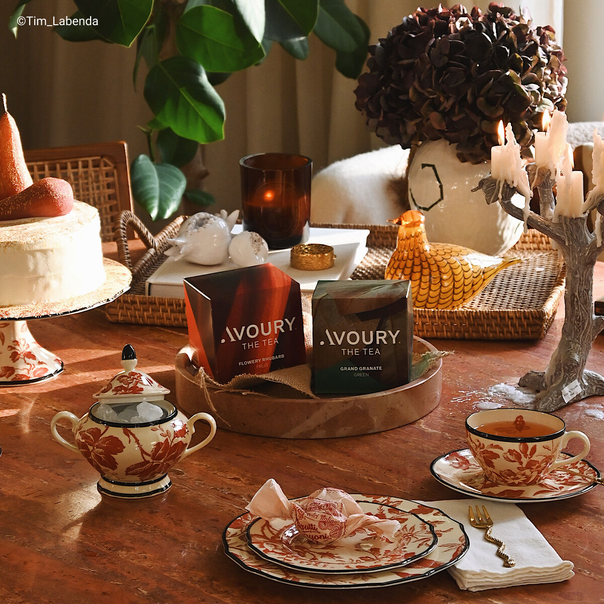 decorated table with Avoury tea boxes