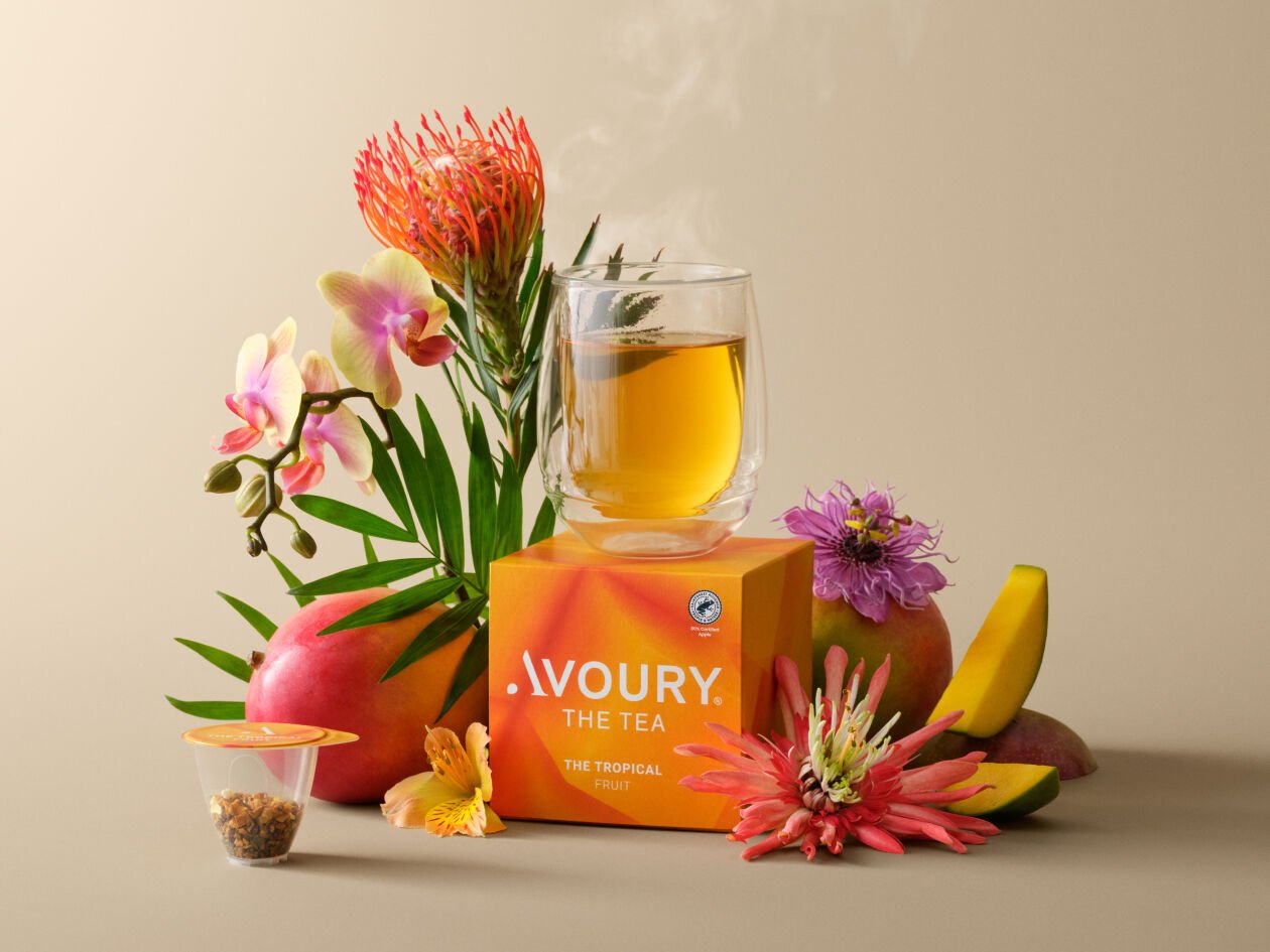 Avoury tea package and glass of tea 